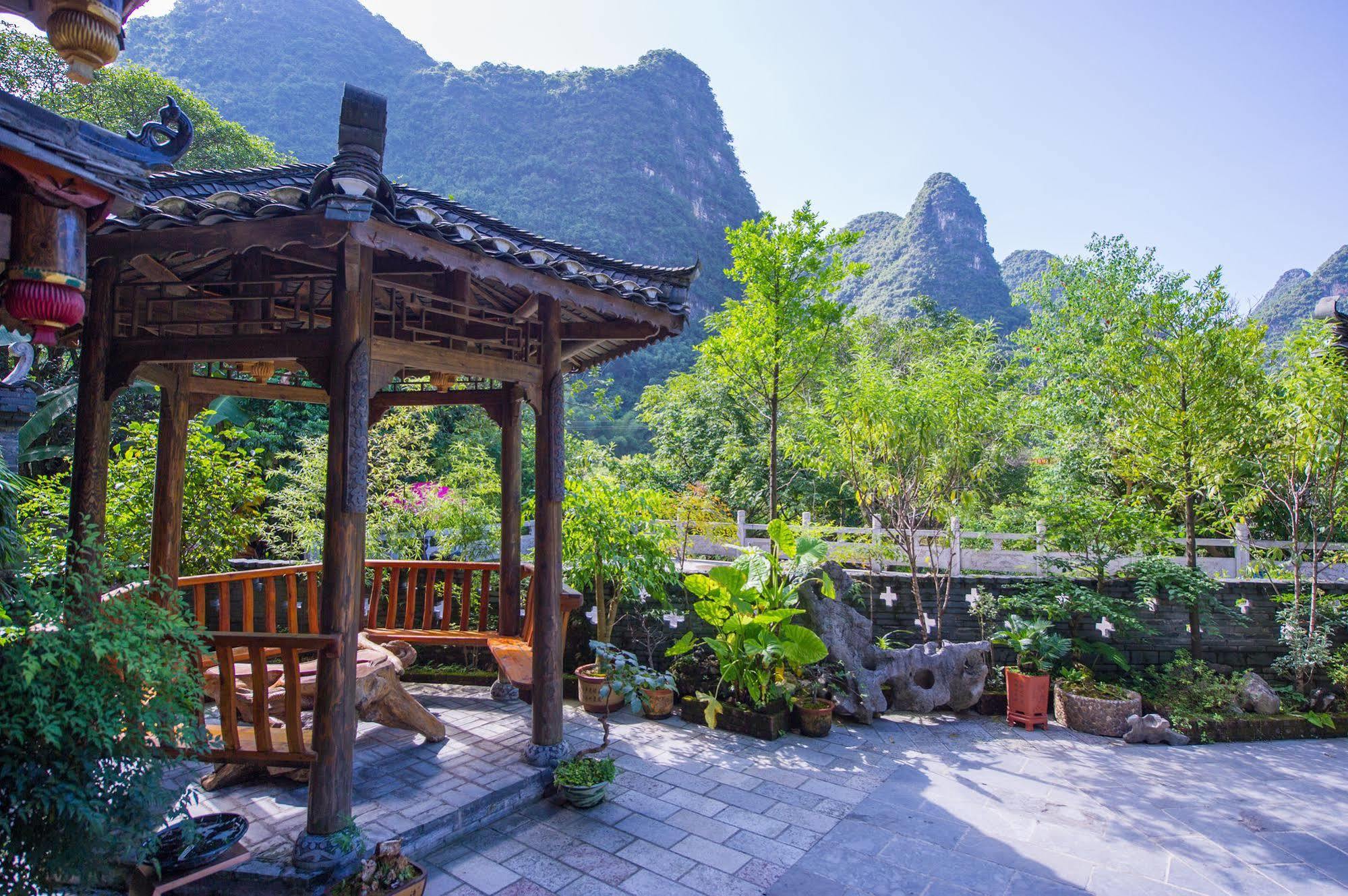 Отель Yangshuo Scenic Mountain Retreat Экстерьер фото
