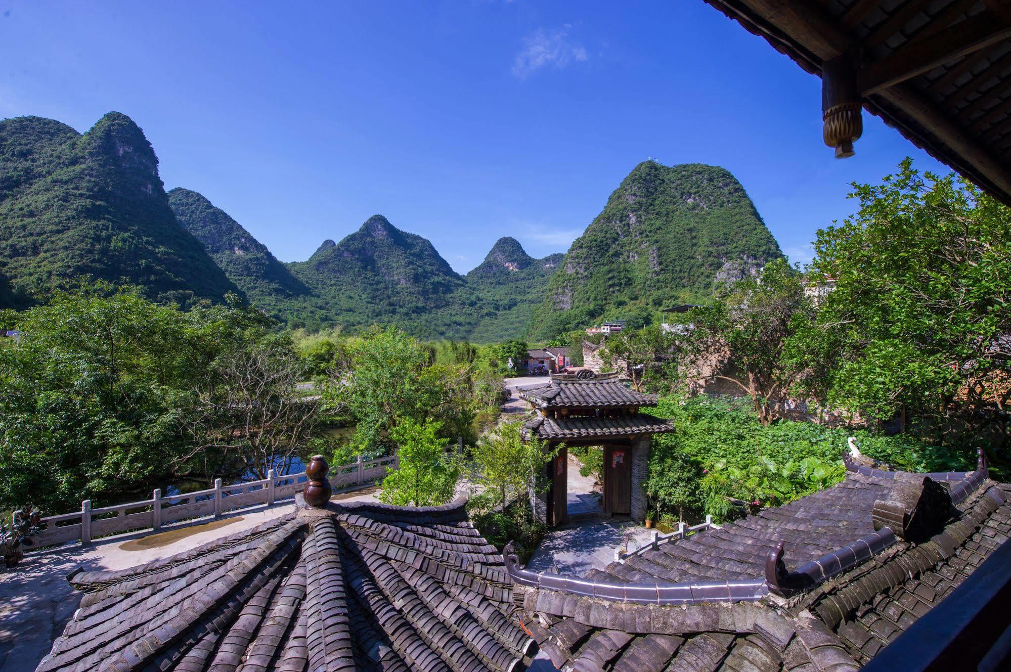 Отель Yangshuo Scenic Mountain Retreat Экстерьер фото
