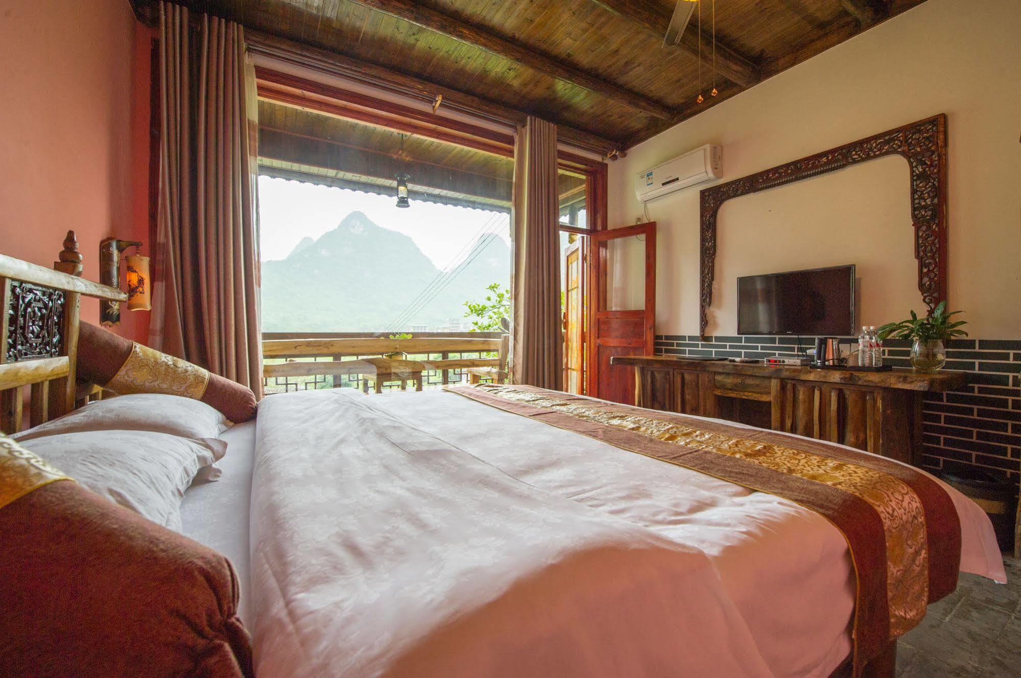 Отель Yangshuo Scenic Mountain Retreat Экстерьер фото