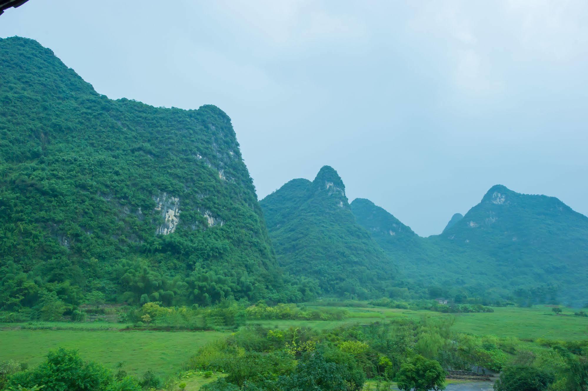 Отель Yangshuo Scenic Mountain Retreat Экстерьер фото
